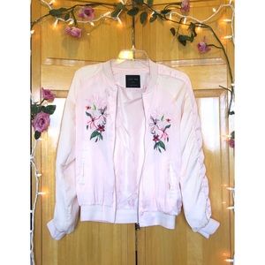 light pink bomber jacket with embroidered flowers